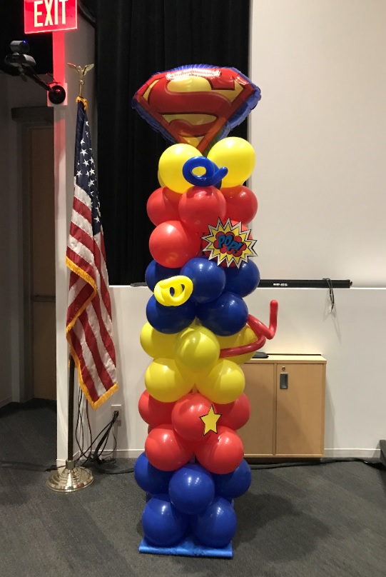Superhero themed reception at Comcast Tucson